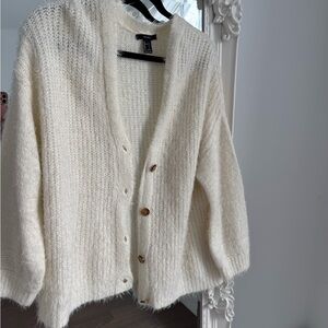 Off white sweater in size L